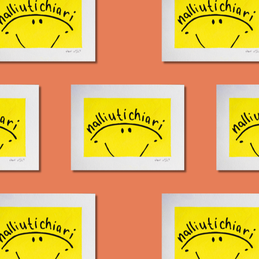 Playful pattern of hand-painted ‘Nalliutichiarit’ artworks arranged on a warm coral background. Each piece features a cheerful black smiley face on bright yellow with the Inuktitut word ‘Nalliutichiarit,’ meaning ‘Happy Birthday,’ curved above. The repetition and vibrant colors create a joyful, celebratory atmosphere.