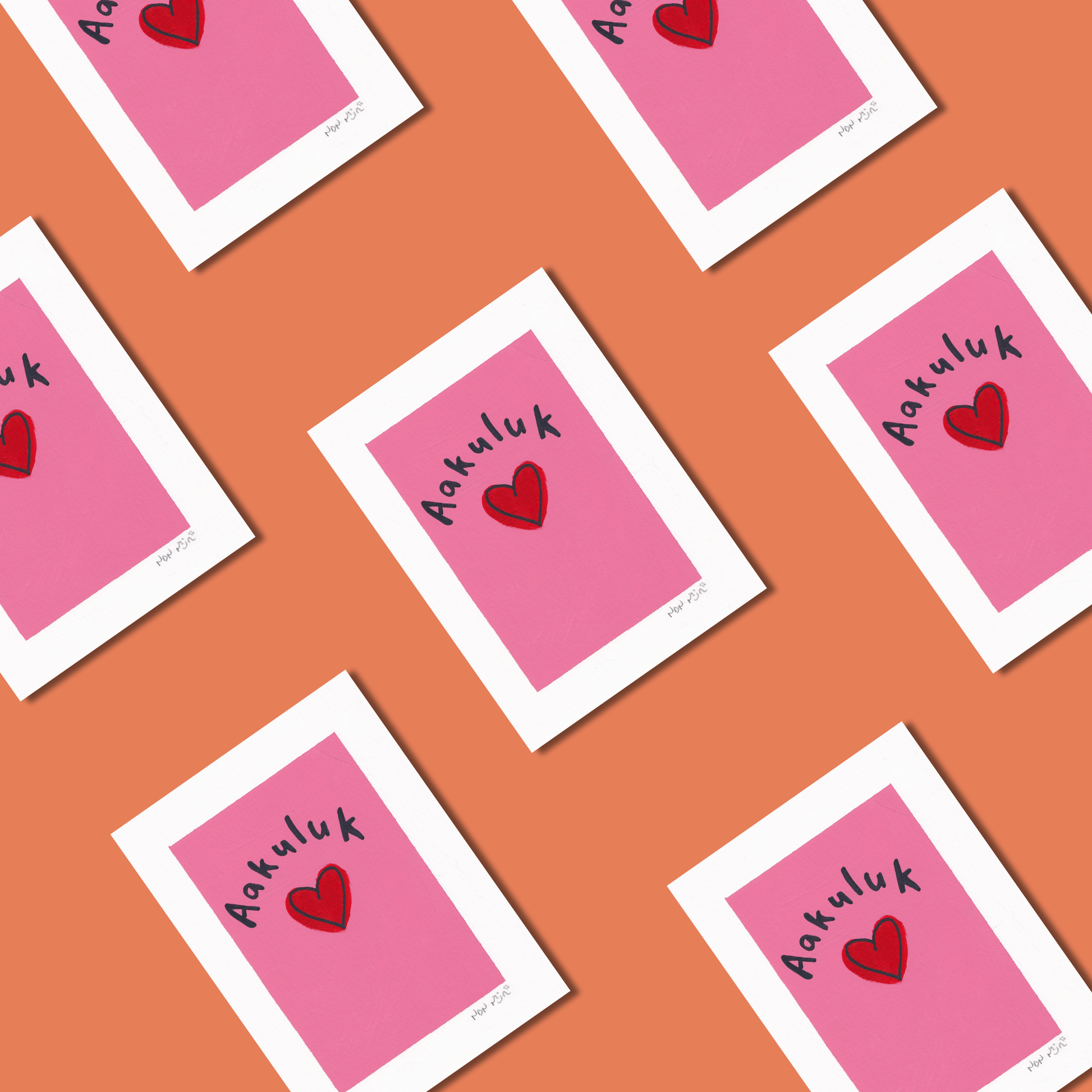 Repeating display of hand-painted ‘Aakuluk’ artworks arranged over a coral background. Each piece features a red heart on a bright pink backdrop with the Inuktitut word ‘Aakuluk,’ meaning ‘I love you.’ The grid composition and warm palette convey affection, joy, and playful visual rhythm.