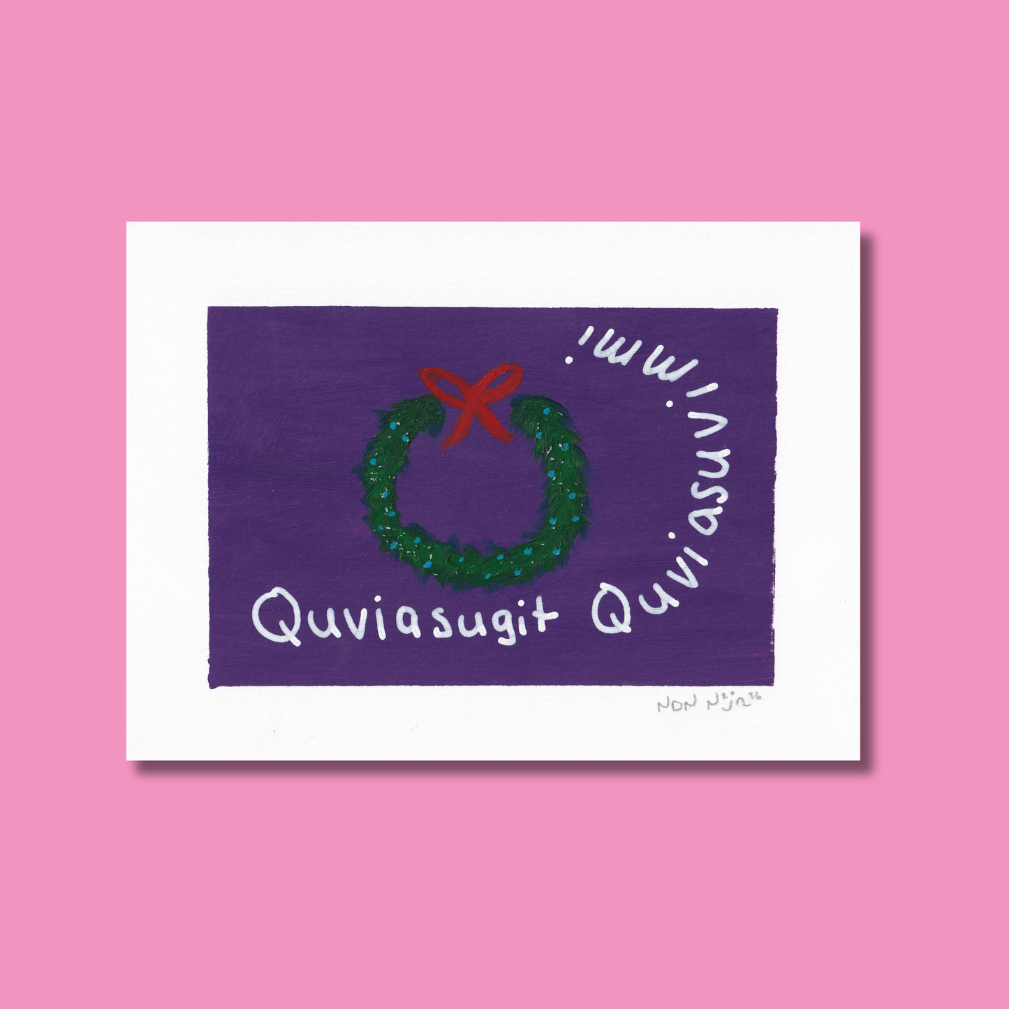 Hand-painted artwork titled ‘Quviasugit Quviasuvik,’ featuring a green holiday wreath tied with a red bow against a deep purple background. The Inuktitut phrase ‘Quviasugit Quviasuvik,’ meaning ‘Merry Christmas,’ curves playfully around the wreath, blending festive joy with gentle Northern minimalism.