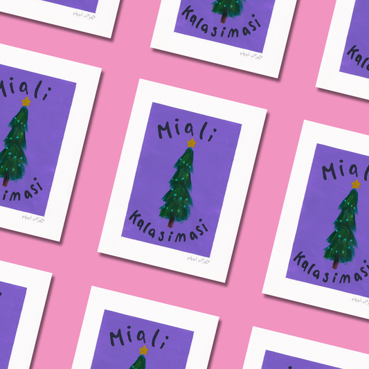 Repeating layout of the hand-painted artwork ‘Miali Kalasimasi,’ featuring multiple illustrations of a green Christmas tree with teal ornaments and a golden star on a bright purple background. The Inuktitut and Romanized text ‘Miali Kalasimasi,’ meaning ‘Merry Christmas,’ is written around the tree in black lettering. The artworks are arranged in a diagonal grid across a vibrant pink background, creating a cheerful, festive display.