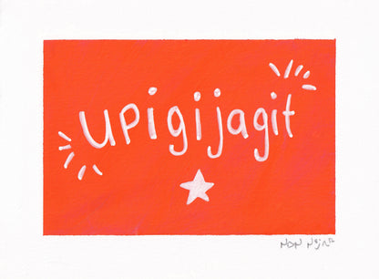 Hand-painted artwork titled ‘Upigijagit,’ meaning ‘I’m proud of you.’ The word is written in playful white lettering across a vibrant orange rectangle, accented by two small sets of white radiating lines and a single white star centered beneath the text. The piece is painted on textured white paper, giving it a warm, tactile quality and a sense of encouragement and joy.